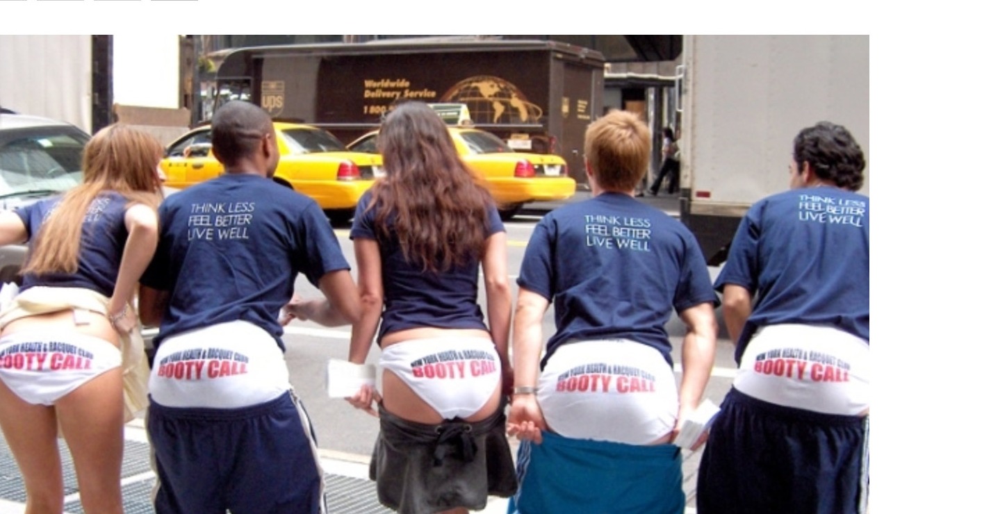 NYHRC Booty Call street stunt — five people on a New York sidewalk revealing underwear printed with BOOTY CALL